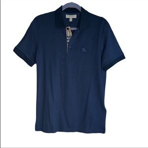 Burberry short sleeve polo shirt. New with tags. Size
small.
